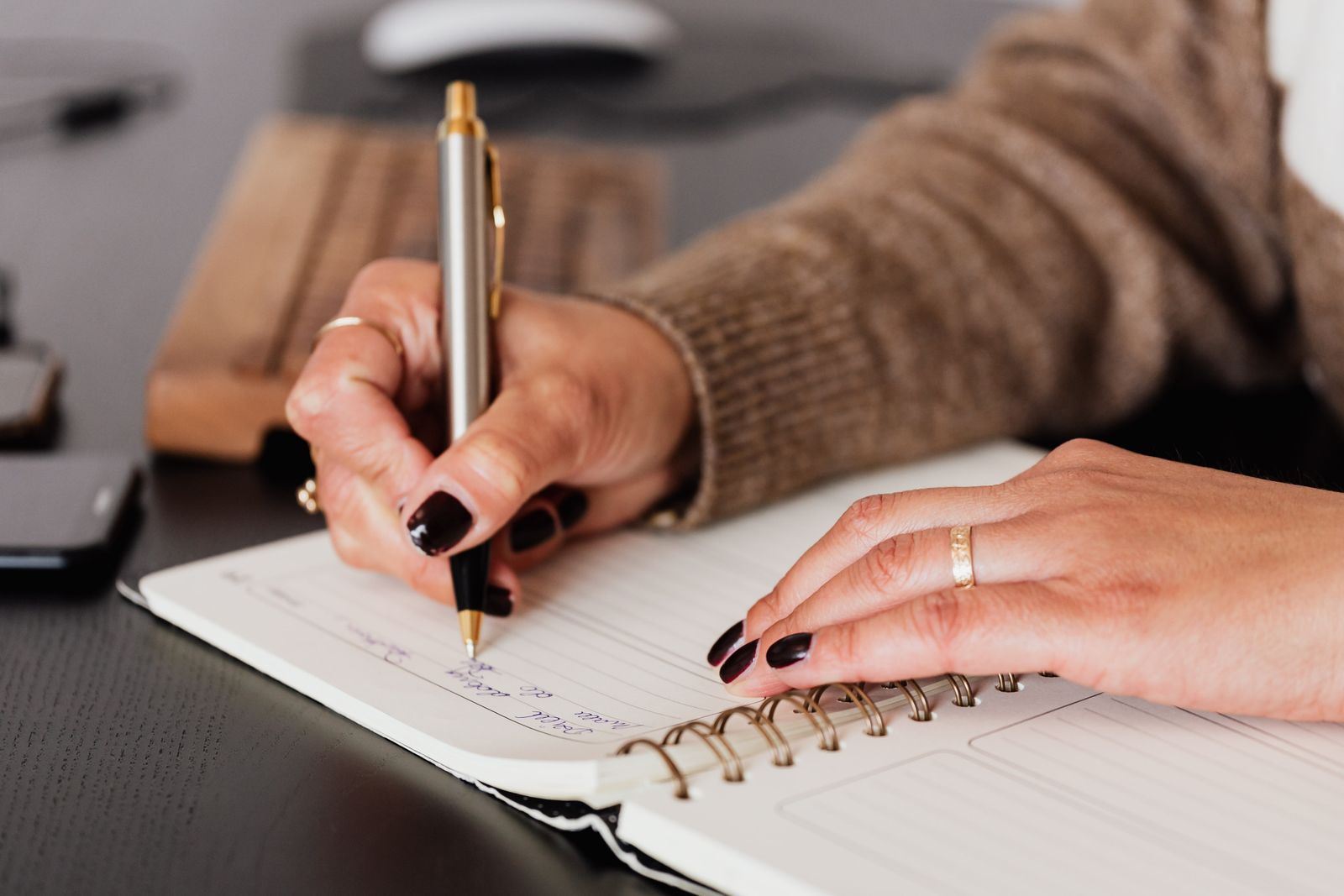 Hiring discussion with CVs and notes on the table