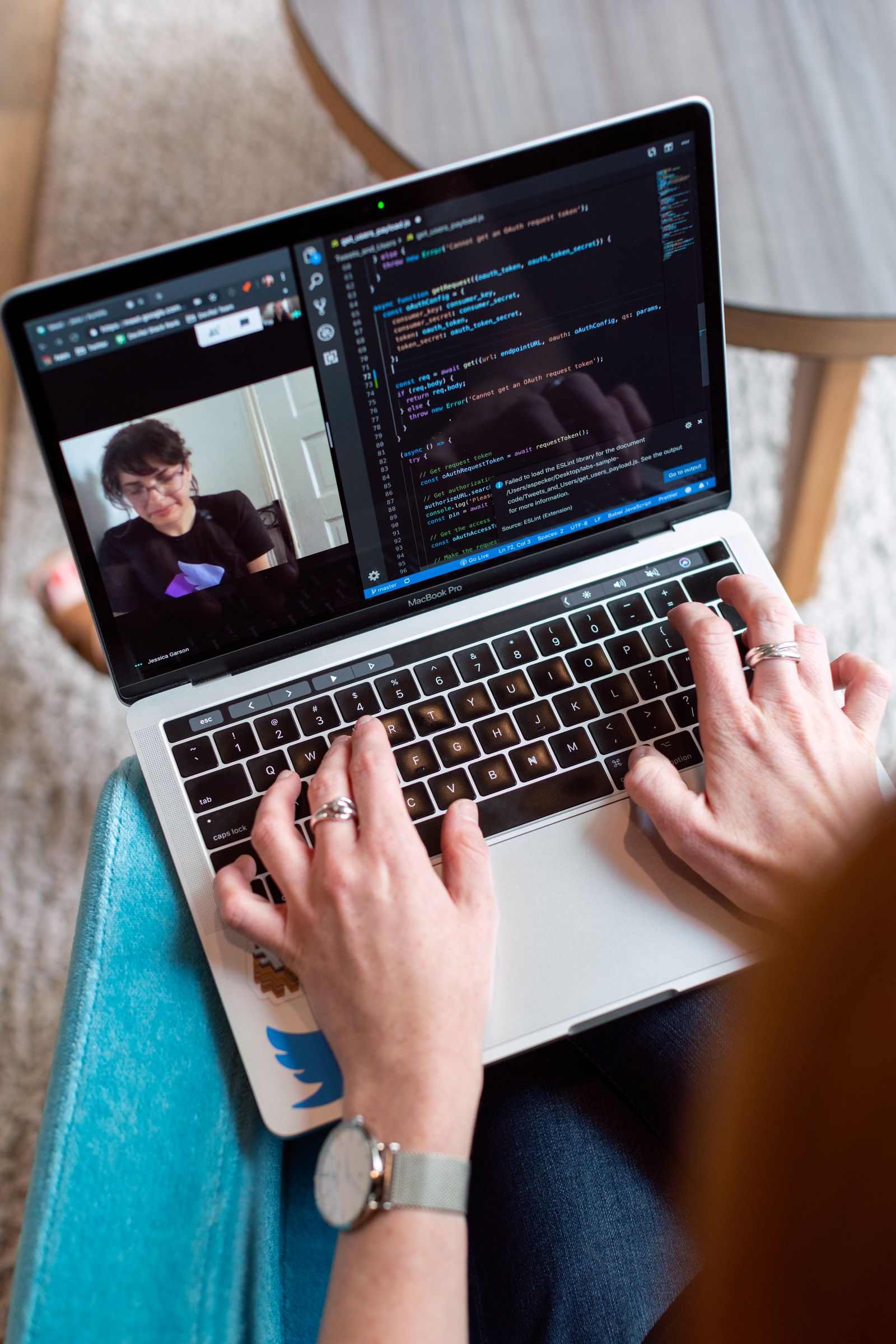 Founder working on a laptop in a bright office