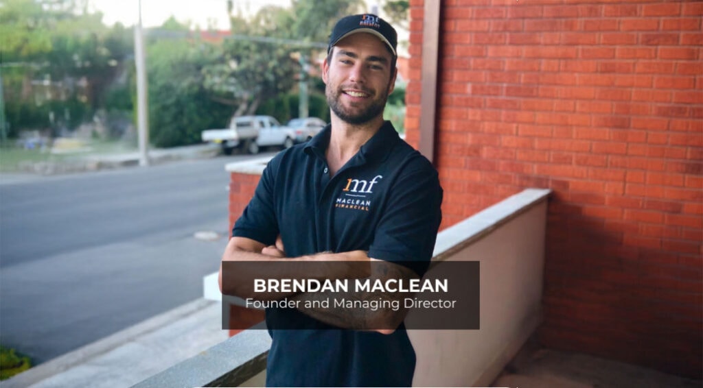 A man in a black polo shirt and hat stands on a balcony, smiling with his arms crossed. Text reads BRENDAN MACLEAN Founder and Managing Director.