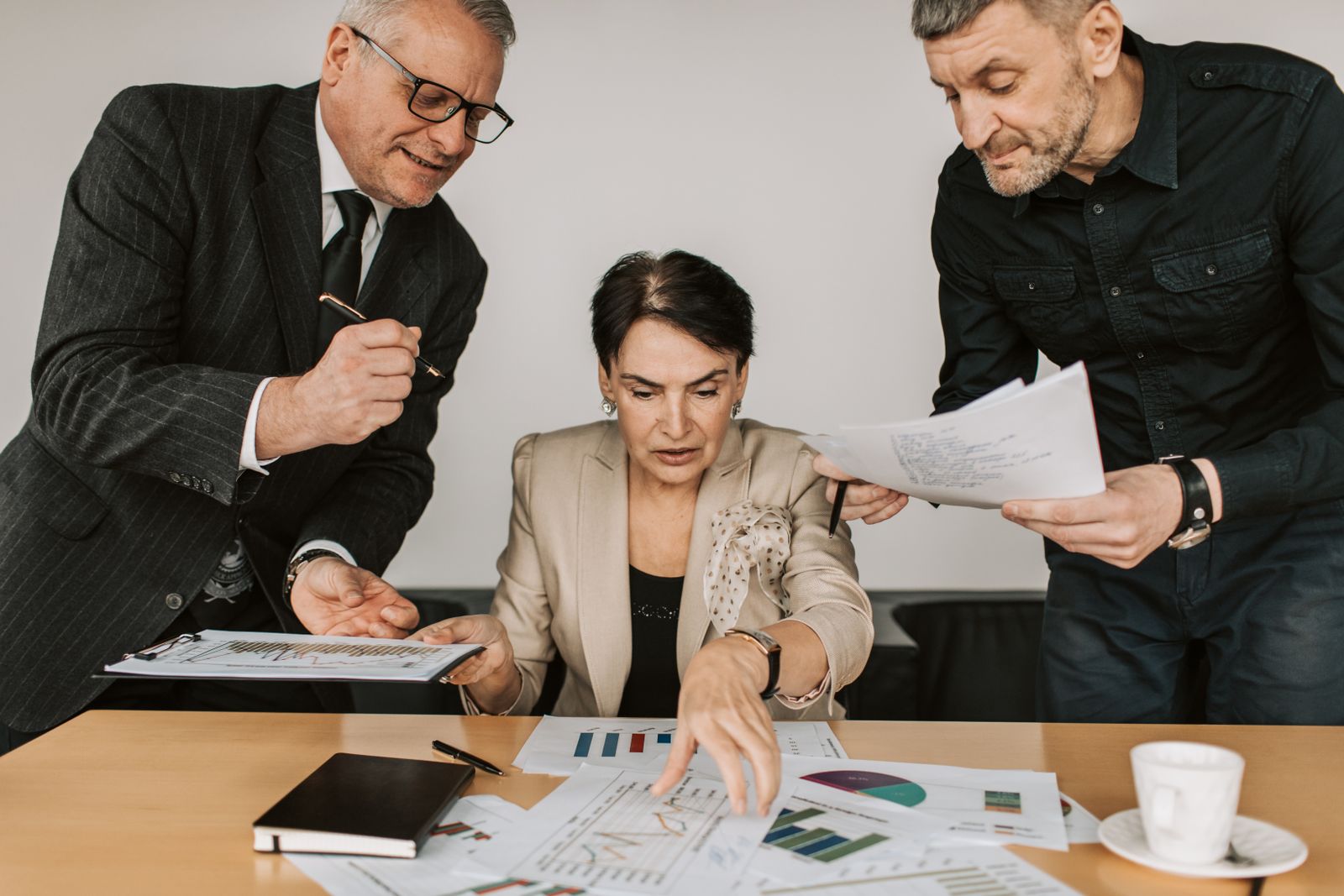 Partners reviewing financial papers in an office