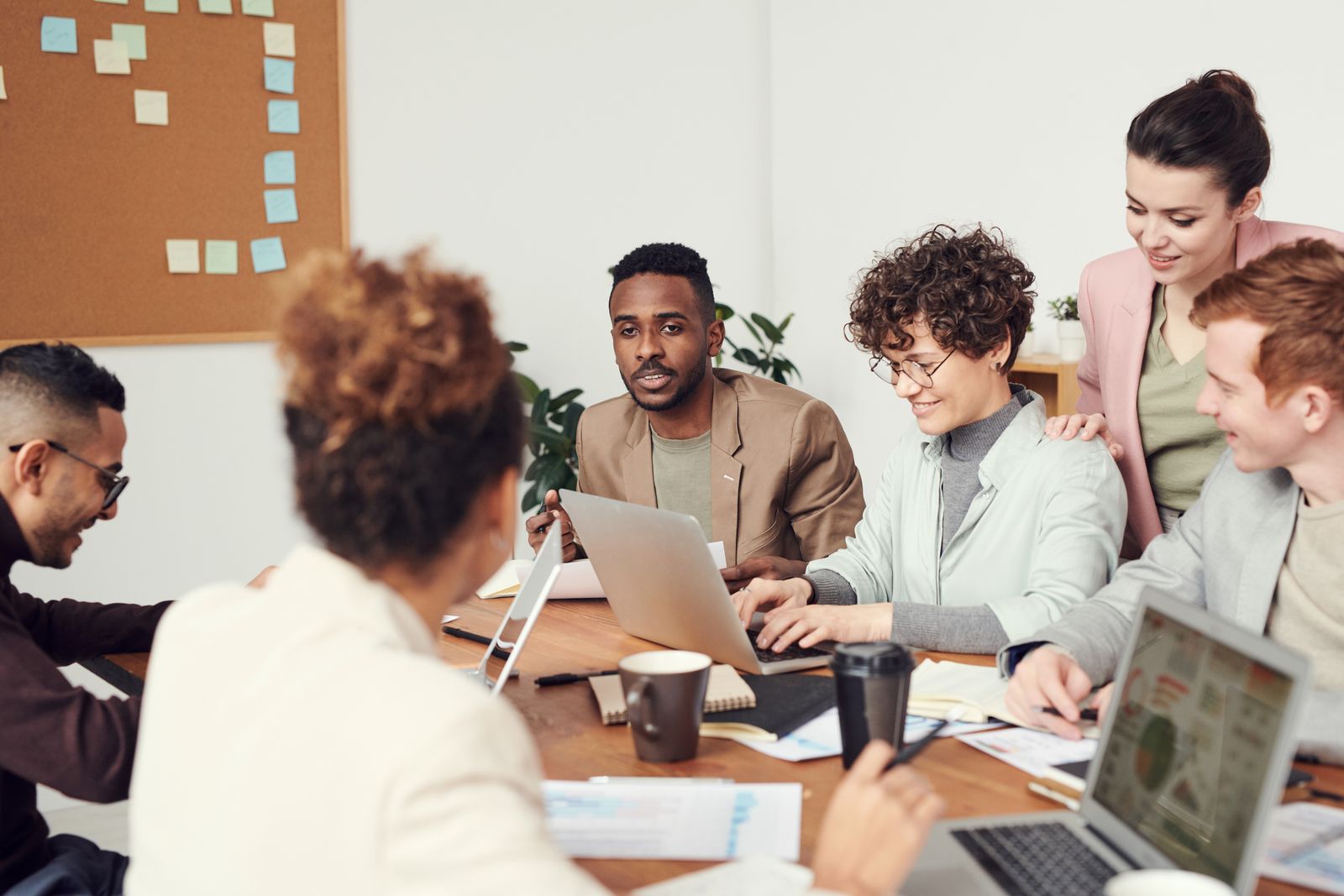Professionals collaborating around a conference table