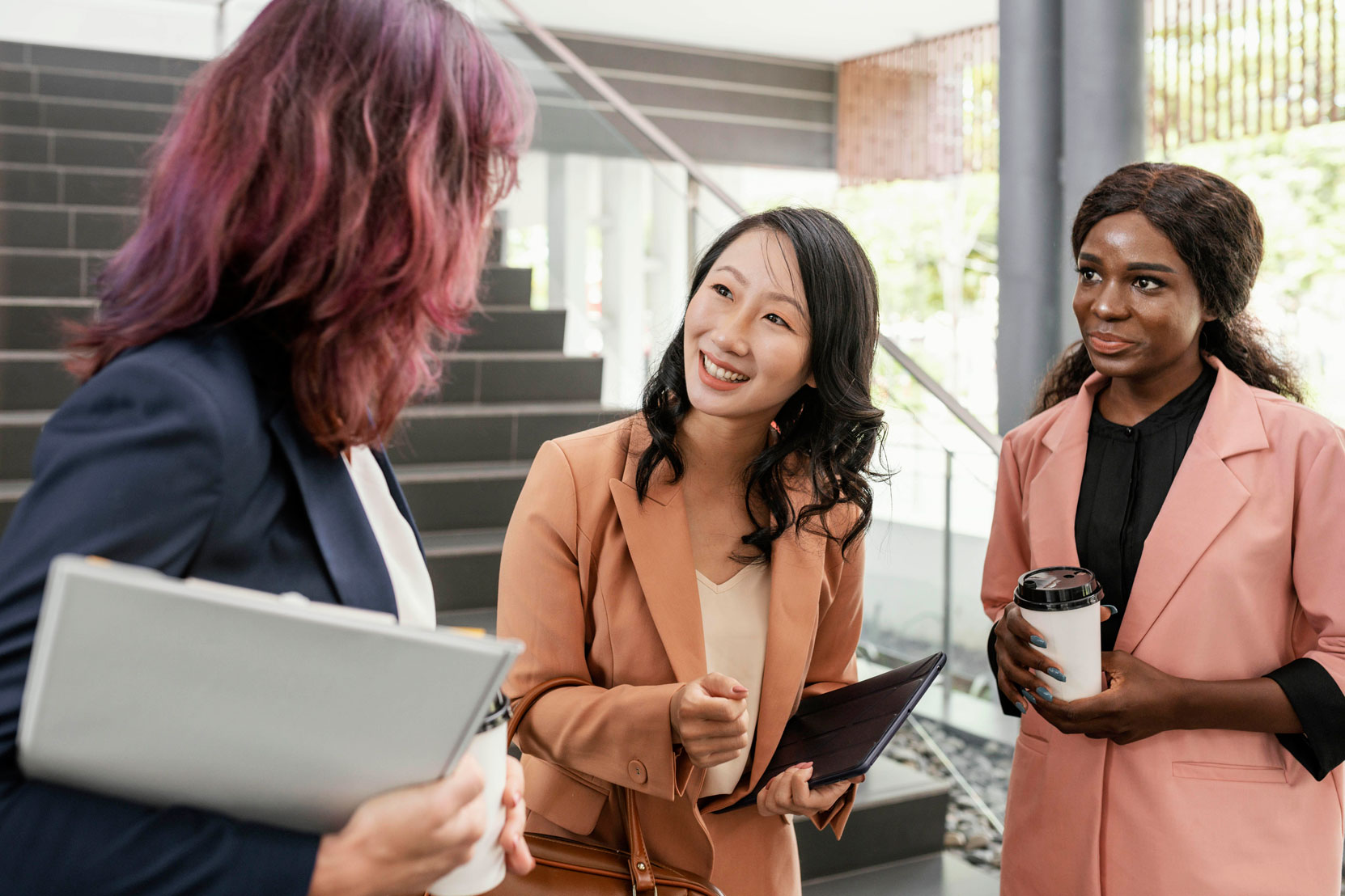 Diverse women meeting for sales discussion