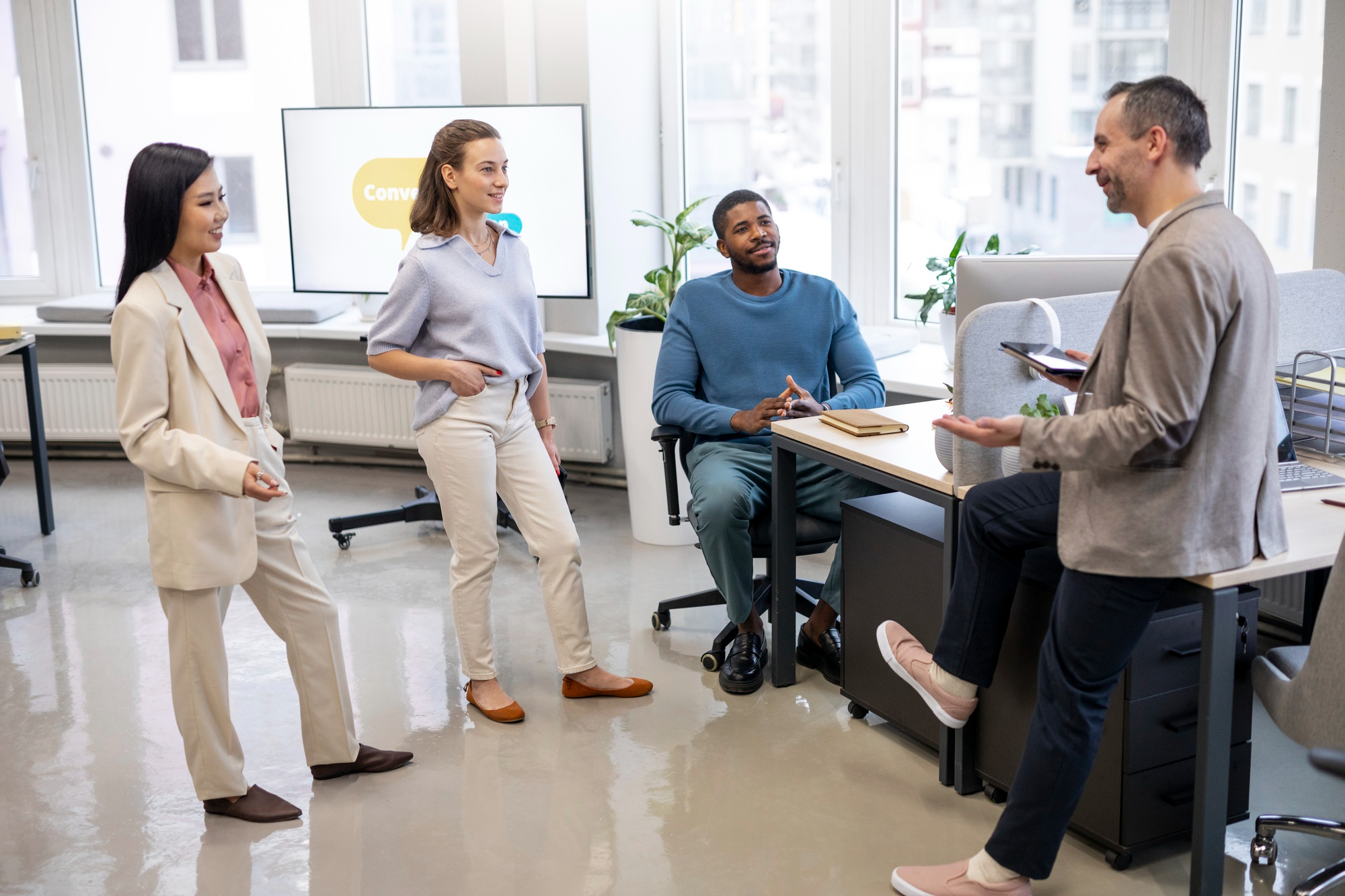 people scaling a sales team at work