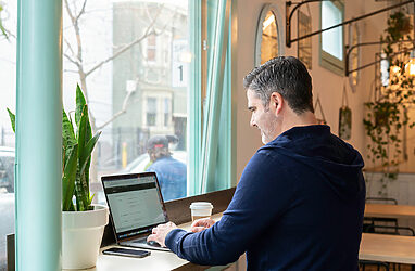 A young professional working on his laptop